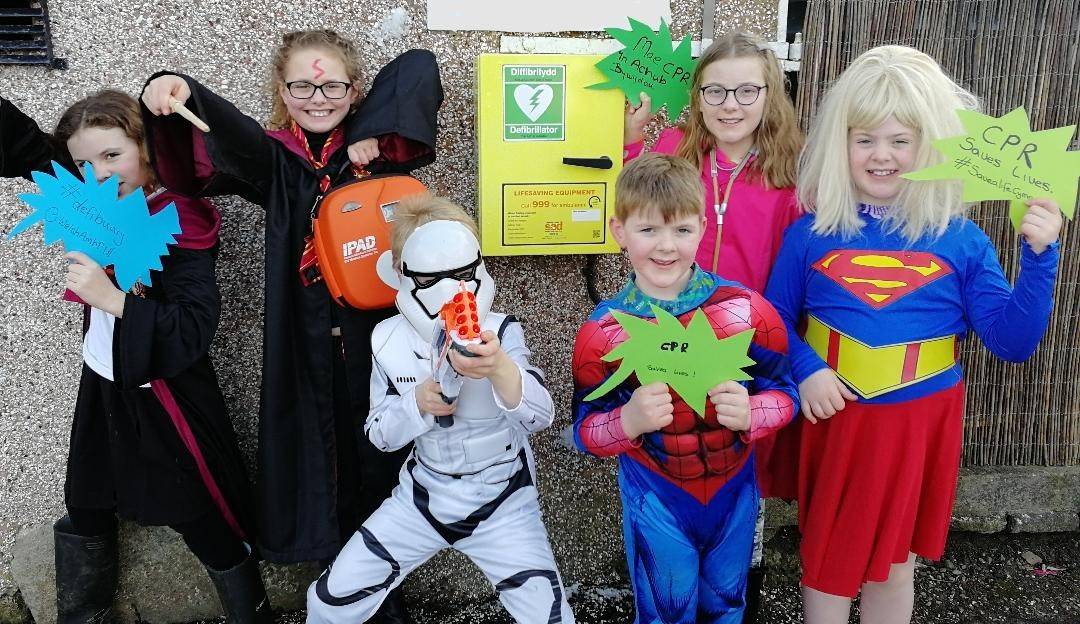 Super Heroes checking their defib